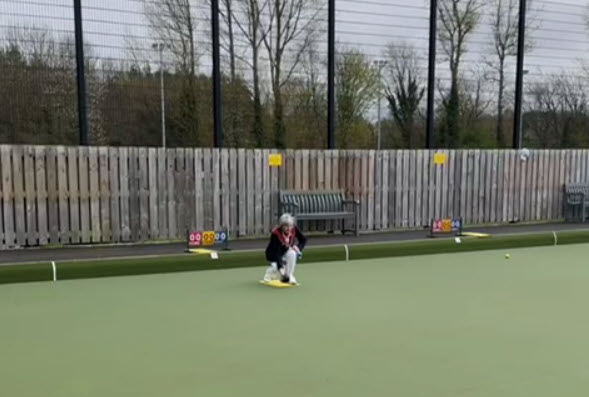 NIWPGL President Nan McBride MBE delivers the first bowl of 2024 at CI Knock BC
