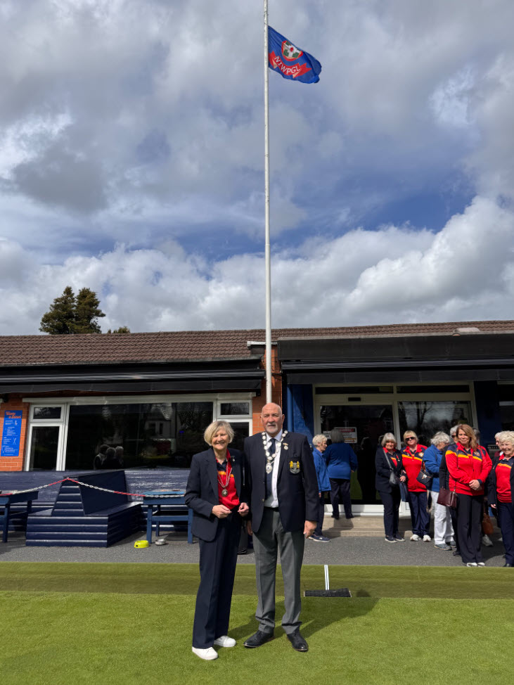 NIWPGL 2026 Flag Unfurling at Belmont BC   The NIWPGL President Moya McCruden and Belmont BC President Robin Stanex
