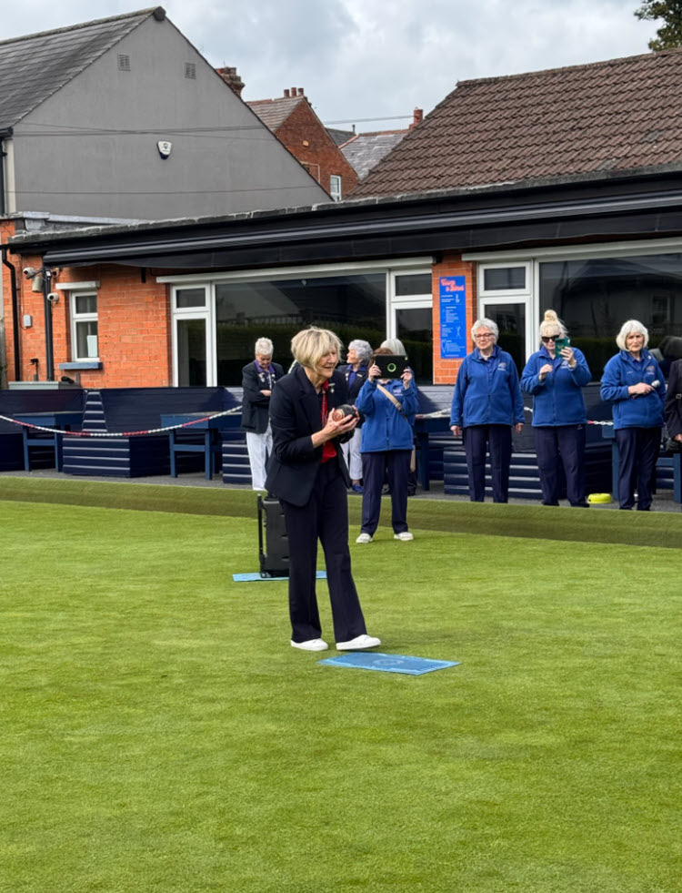 NIWPGL 2026 Flag unfurling at Belmont BC   The NIWPGL President Moya Crunden delivers the first bowl